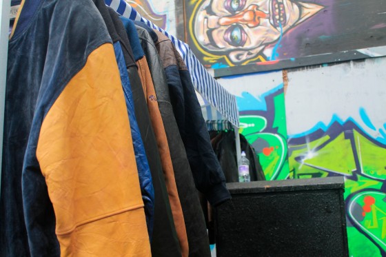 Street art and clothing stands make for a typical scene at Brick Lane's weekend market.